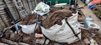 2 Hypo bags of top soil from garden