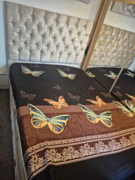 Double Bed with Tufted Grey Headboard – Good Condition